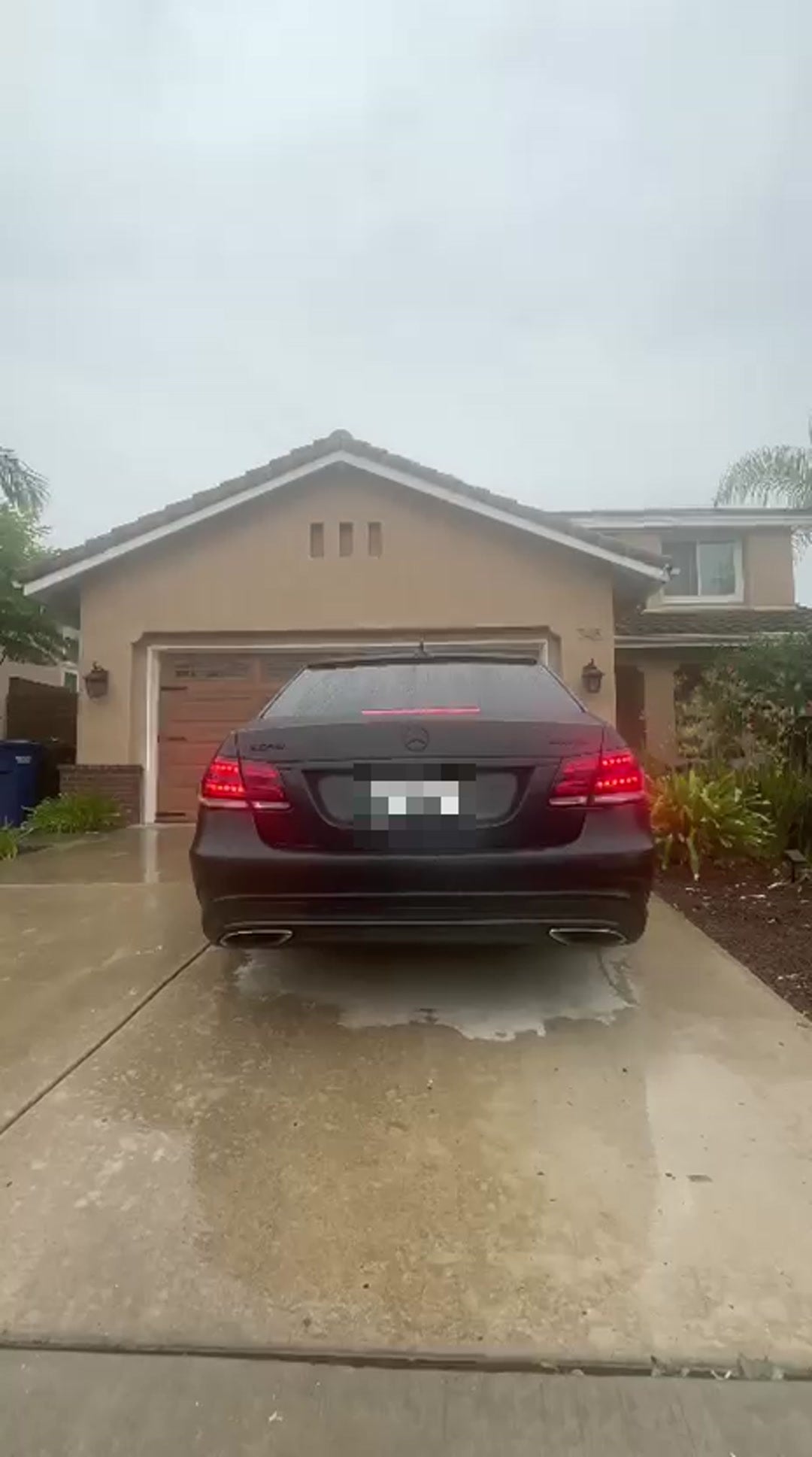 Mercedes-Benz E550 W212 rear view with catless downpipes and heat shielding