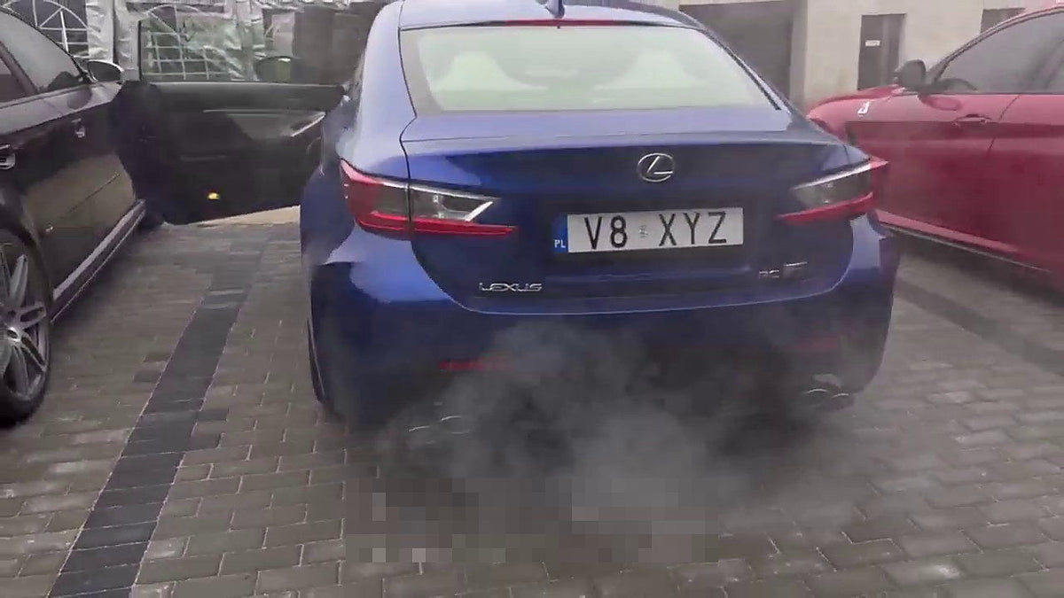 Lexus RC F coupe on the road, valved SUS304 cat-back fitted, no readable number plate visible in frame