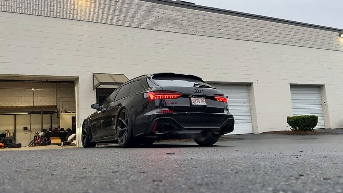 Audi RS6 C8 (C8) Avant on the road, SUS304 valved cat-back with straight down-pipe fitted, no readable number plate visible in frame